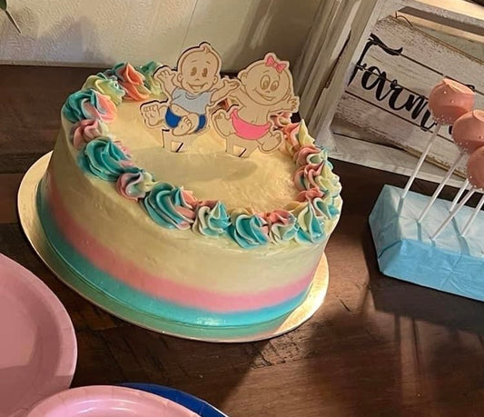 Gender Reveal Cake toppers you get a boy and a girl